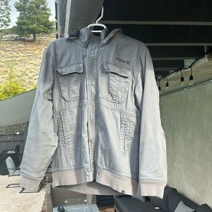 Hurley XL hooded jacket. Fleece lined. Zip+button up. Removable hood. Grey.